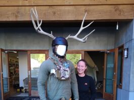 Mary Gibson and ‘Glen’ in front of First Lite. Photo credit: Isaiah Frizzell